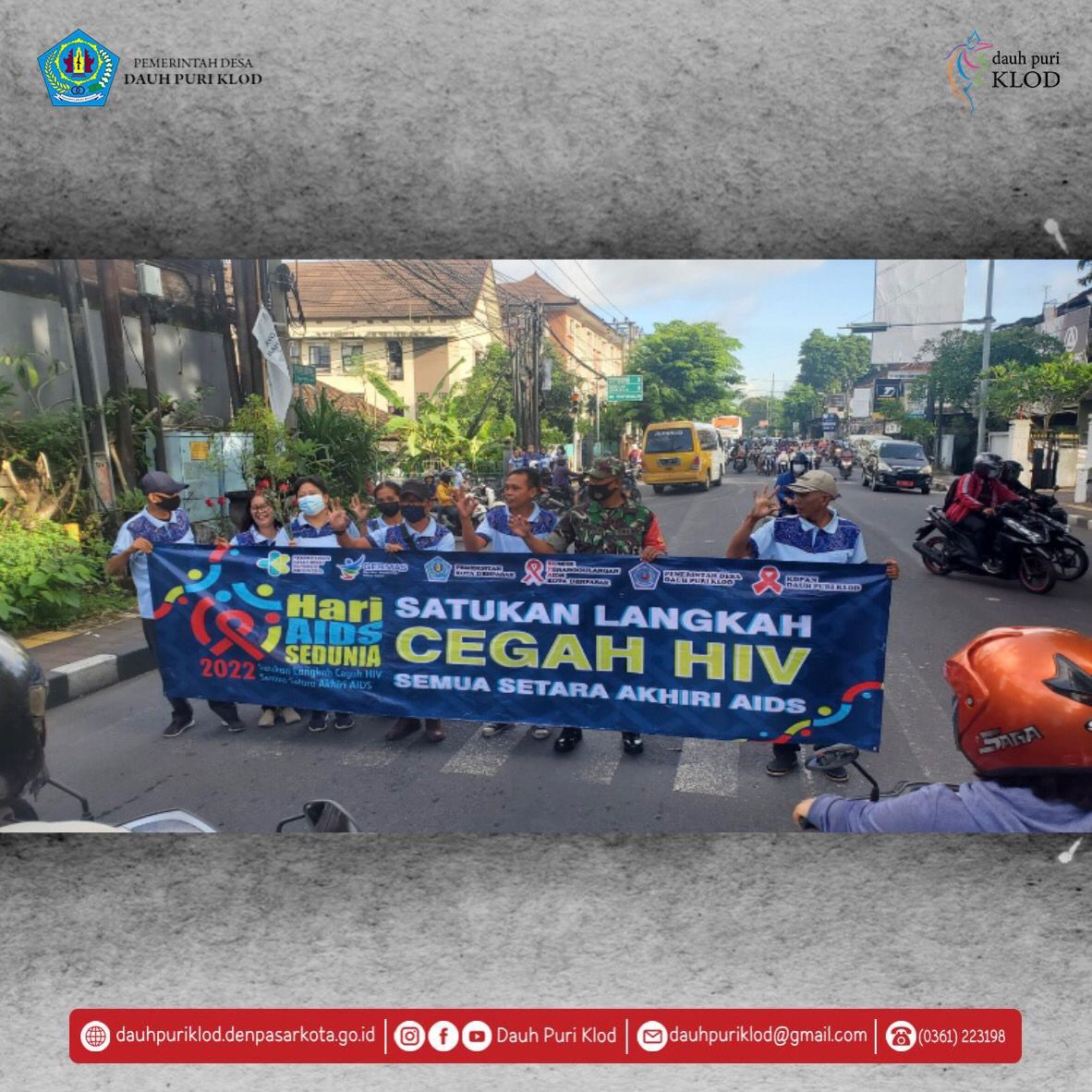 KDPAN DESA DAUH PURI KLOD BAGI-BAGI BUNGA DI HARI AIDS SEDUNIA